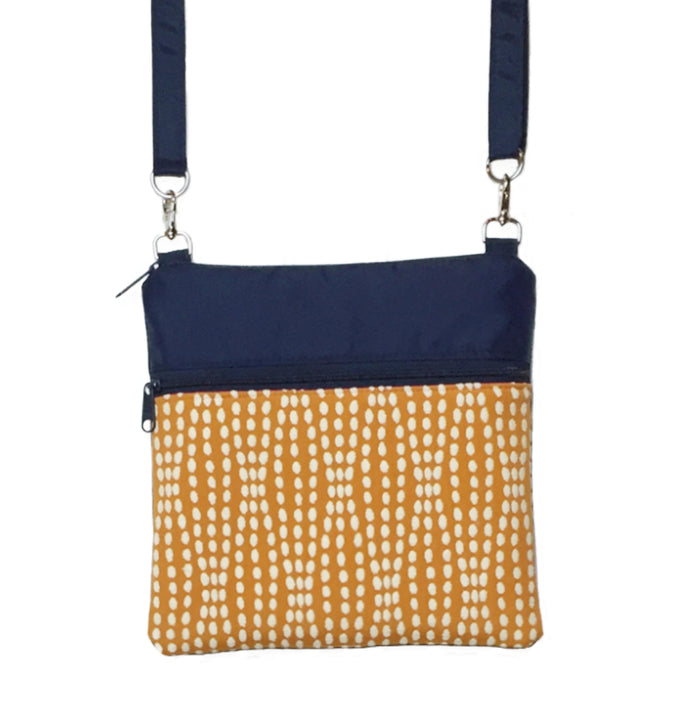 Wavy Dots in Orange Mini Square Crossbody Purse in Orange and Navy Nylon - A small bag that combines fabric and waterproof nylon